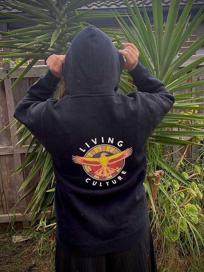 Male model wearing Living Culture Hoodie